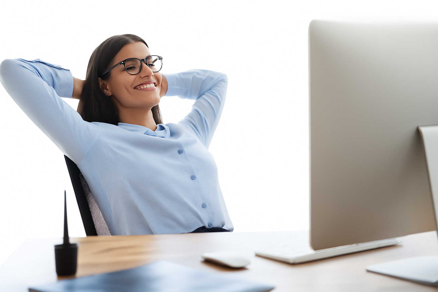 Satisfied business owner relaxing at desk with peace of mind from comprehensive BOP insurance coverage